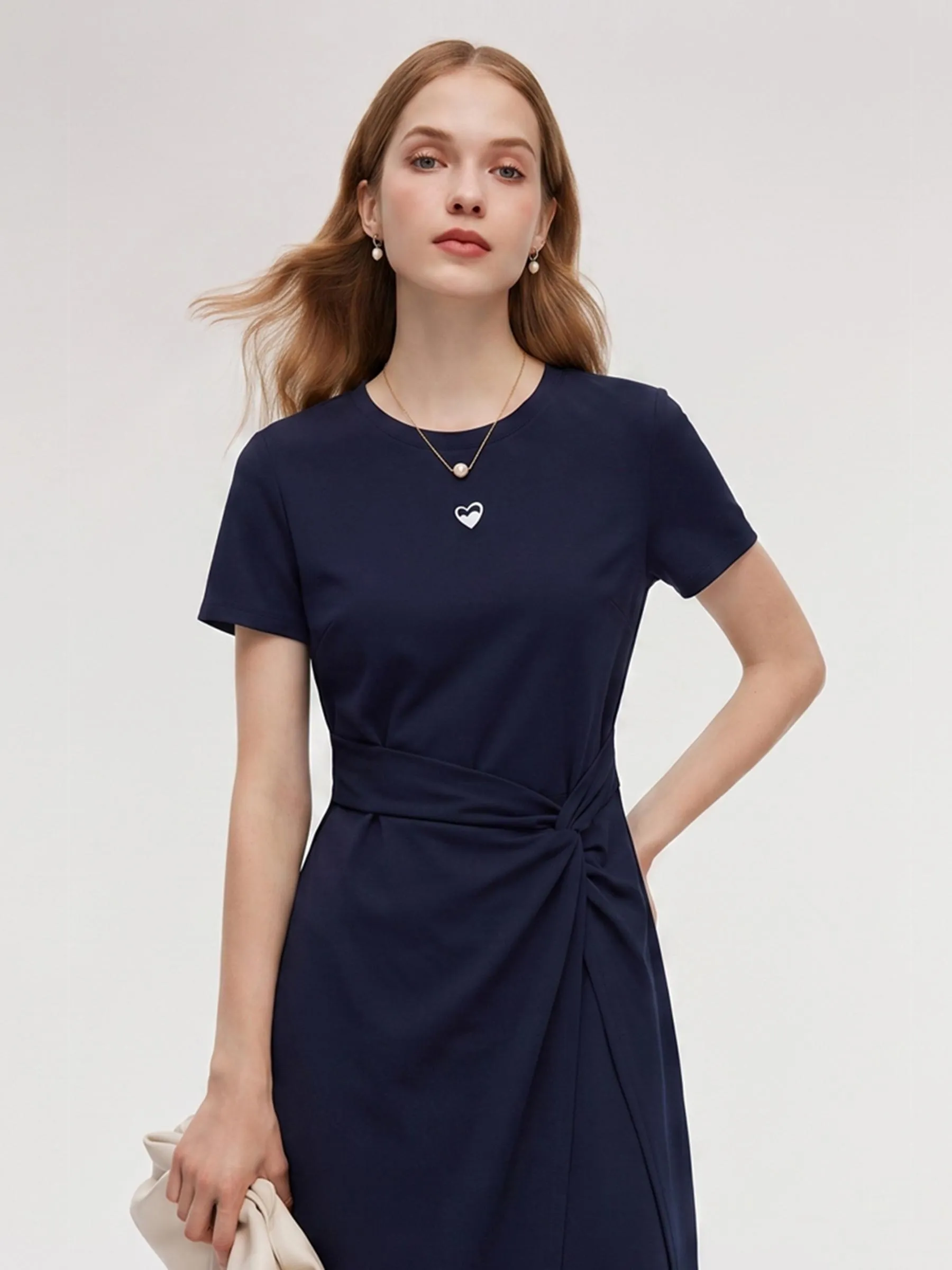 asymmetrical twist knit midi dress Cream Asymmetrical Tassel Hem Knit Midi Dress